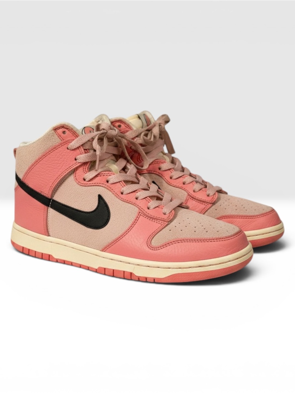 Nike Women's Coral Pink High-Top Sneakers with Black Swoosh